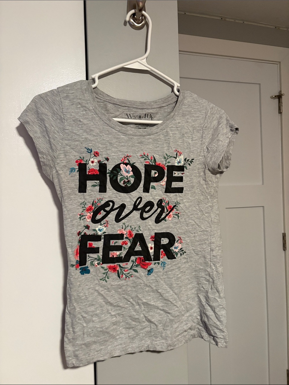 Wound Up Gray Short Sleeve Tee with Black Text and Pink Floral Accents